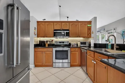 $569,900 | 5875 Sun Pointe Circle, Boynton Beach, FL 33437