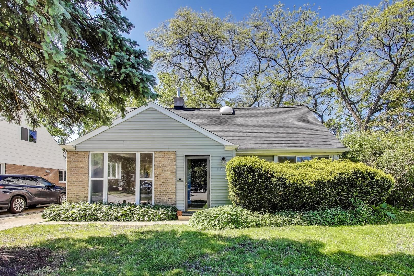 600 Long Road Glenview, IL 60025 - Photo 1 of 33 a house that has a tree in front of the house