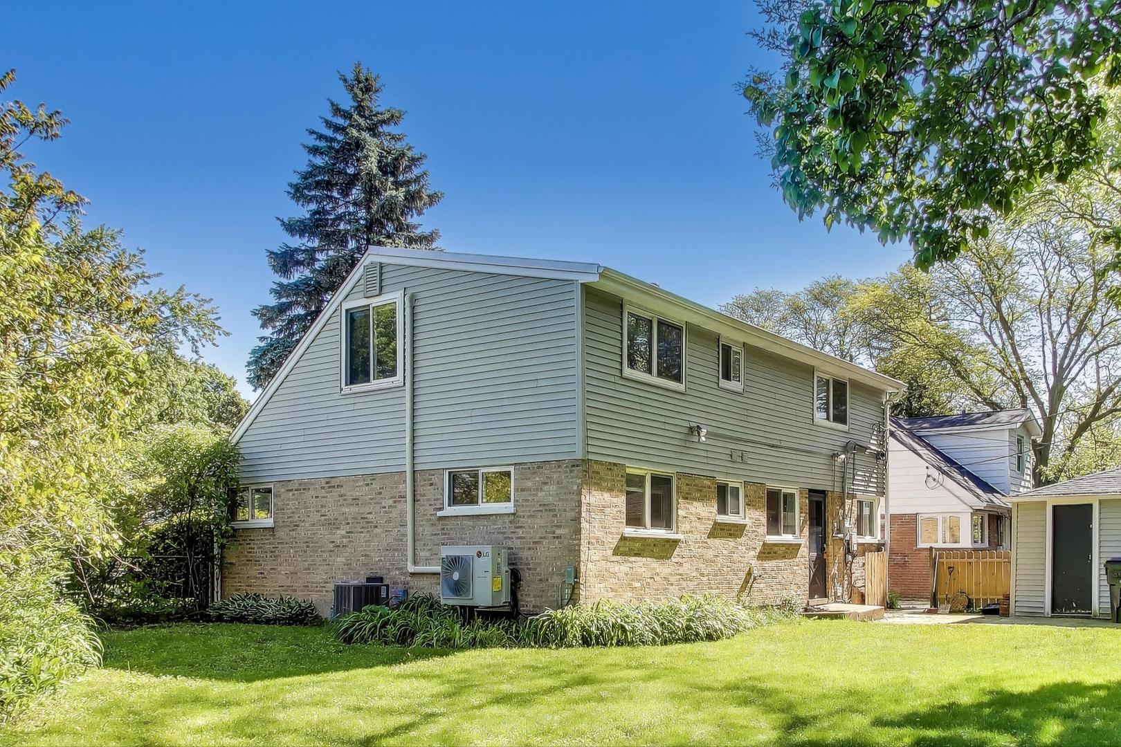 600 Long Road Glenview, IL 60025 - Photo 28 of 33 a front view of a house with a yard