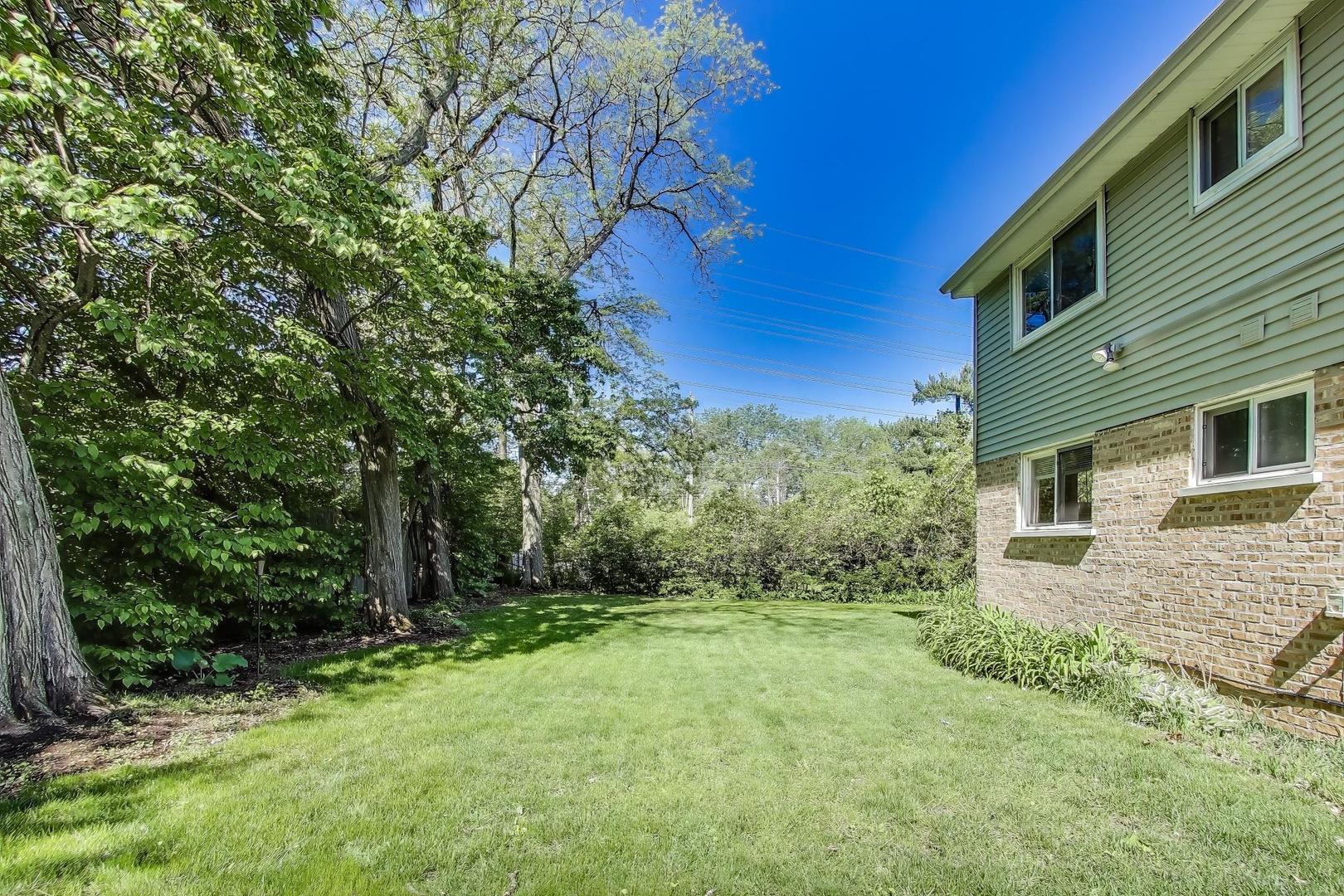 600 Long Road Glenview, IL 60025 - Photo 30 of 33 a view of a backyard with plants and large trees