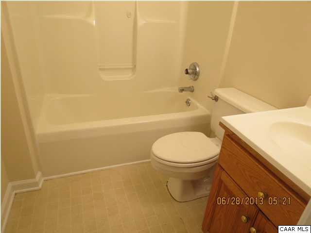 1099 Kingsway Road Afton, VA 22920 - Photo 21 of 21 a white toilet sitting next to a bath tub