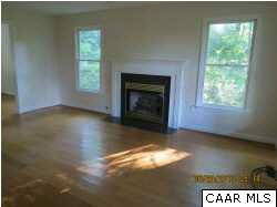 1099 Kingsway Road Afton, VA 22920 - Photo 5 of 21 an empty room with windows and fireplace