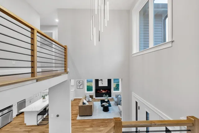 a view of livingroom with furniture and workspace