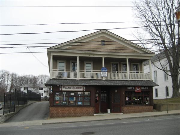 2064-2076 Main Street Three Rivers, MA 01080 - Photo 1 of 1 a front view of a house with garage