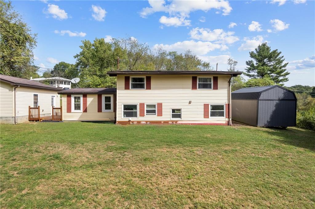 211 Stuber Road New Brighton, PA 15066 - Photo 29 of 33 a view of a yard in front of a house with large trees