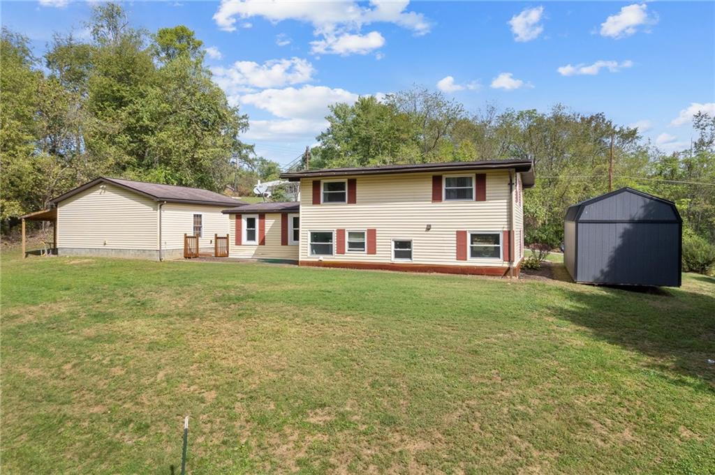 211 Stuber Road New Brighton, PA 15066 - Photo 30 of 33 a house view with a garden space