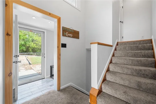 a view of an entryway with staircase