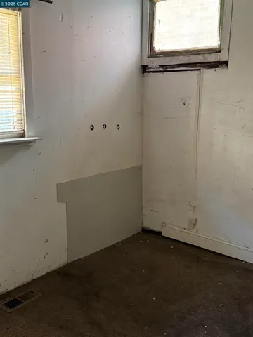 a kitchen with kitchen island a stove and a sink