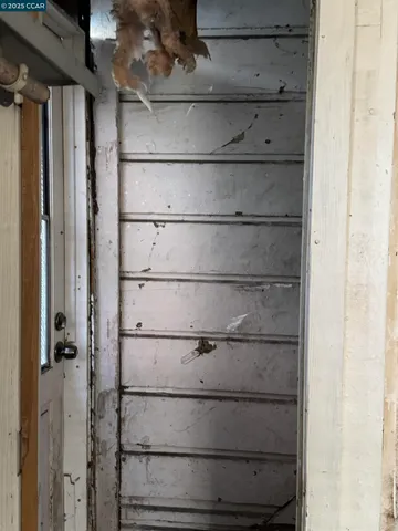 a kitchen with a sink a counter top space and appliances