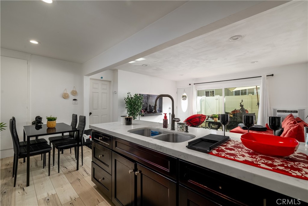 3088 Panorama Road, Unit D Riverside, CA 92506 - Photo 8 of 13 a kitchen with a table chairs stove and kitchen view
