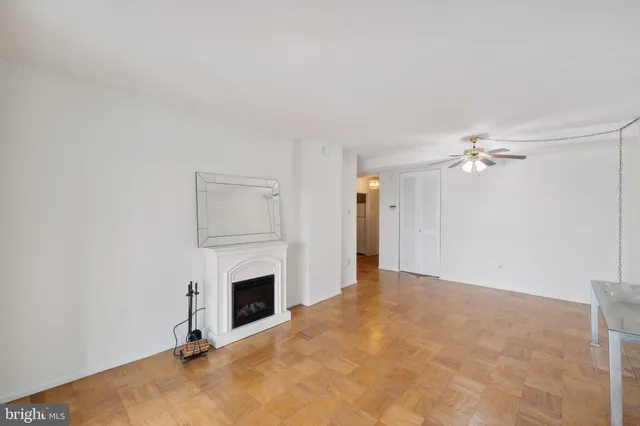 a view of an empty room with a window