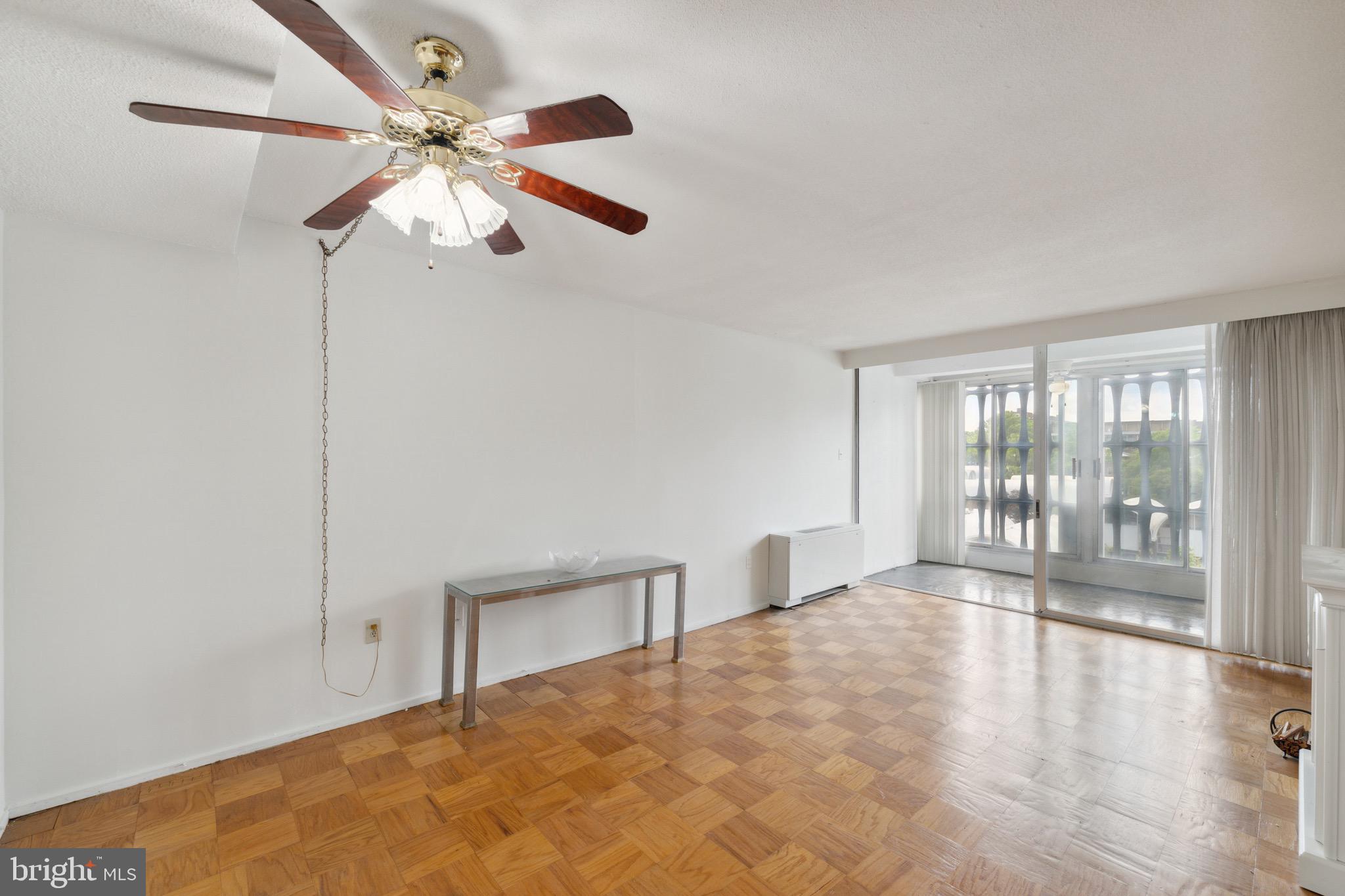 1301 Delaware Avenue Southwest, Unit N403 Washington, DC 20024 - Photo 5 of 14 a view of an empty room with a window