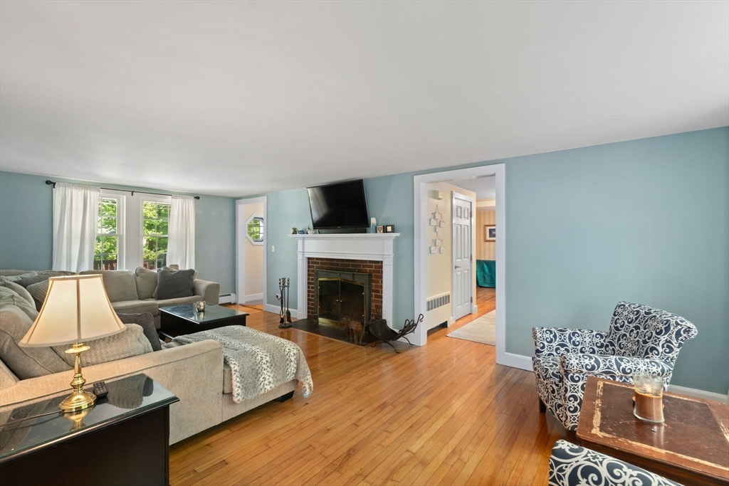 12 Millbrook Road Westwood, MA 02090 - Photo 12 of 28 a living room with furniture fireplace and flat screen tv