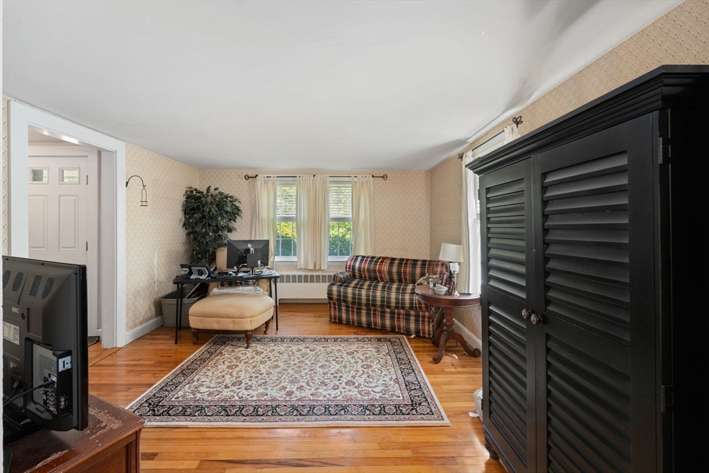 12 Millbrook Road Westwood, MA 02090 - Photo 13 of 28 a living room with furniture rug and wooden floor