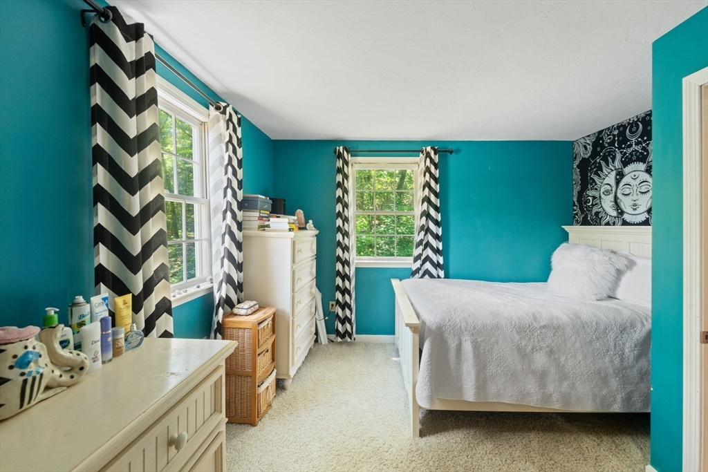 12 Millbrook Road Westwood, MA 02090 - Photo 18 of 28 a bedroom with furniture and a large window