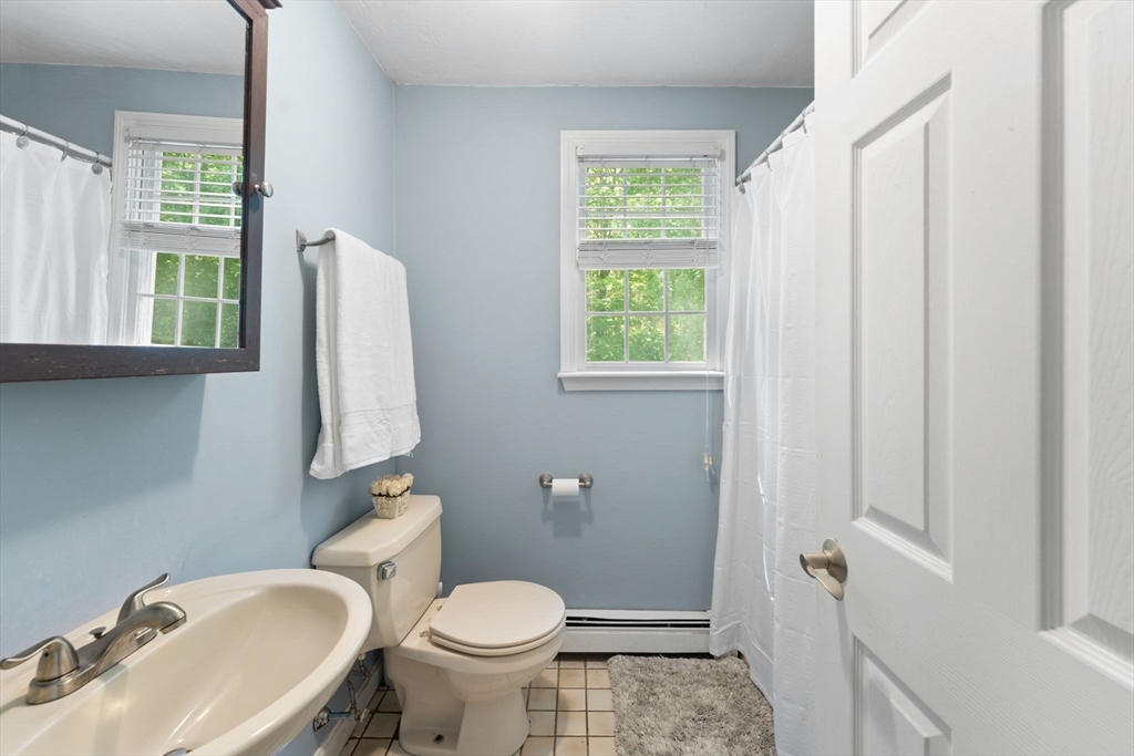 12 Millbrook Road Westwood, MA 02090 - Photo 19 of 28 a bathroom with a sink toilet and shower