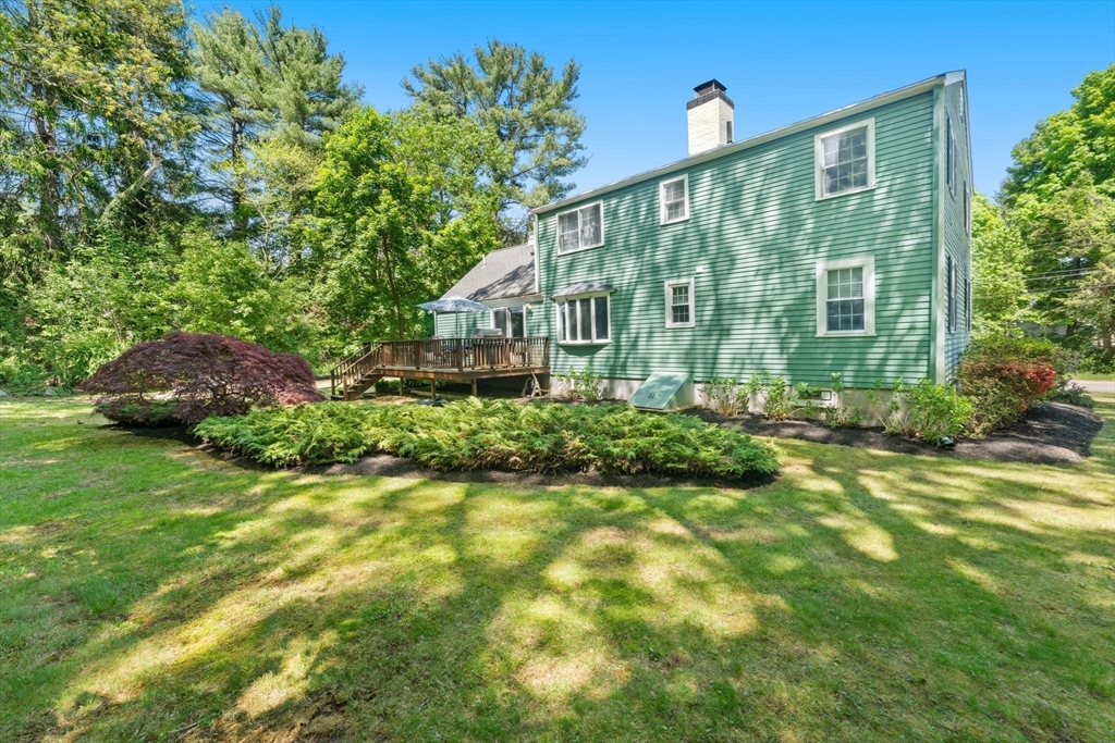 12 Millbrook Road Westwood, MA 02090 - Photo 21 of 28 a front view of house with yard and green space