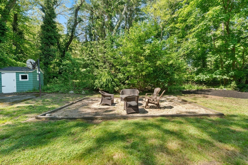 12 Millbrook Road Westwood, MA 02090 - Photo 27 of 28 a view of backyard with a table and chairs