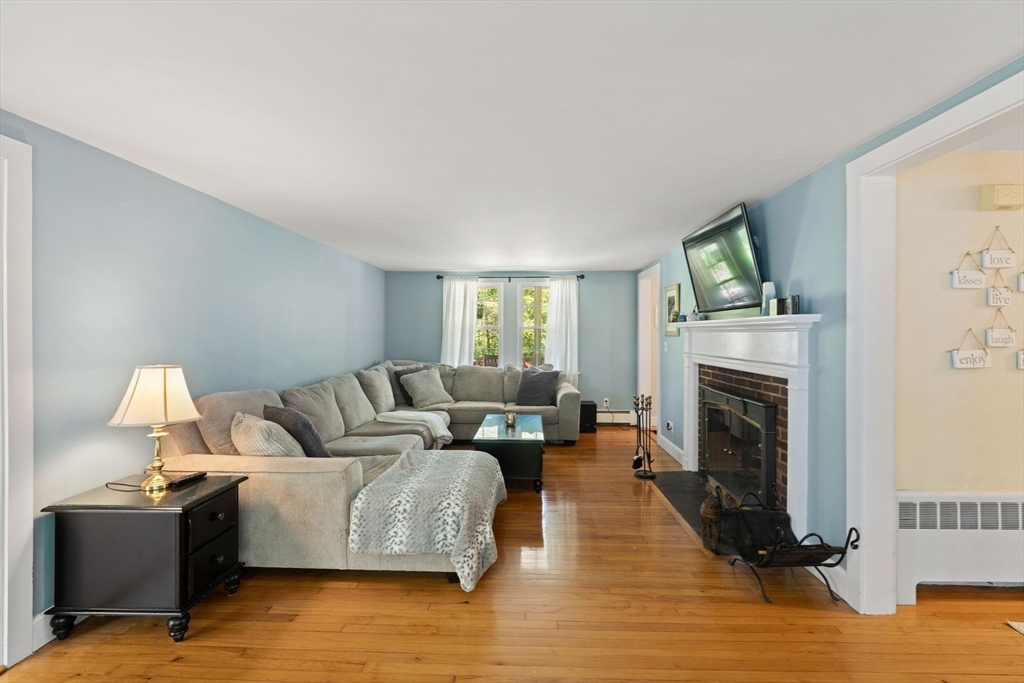 12 Millbrook Road Westwood, MA 02090 - Photo 8 of 28 a living room with furniture and a fireplace