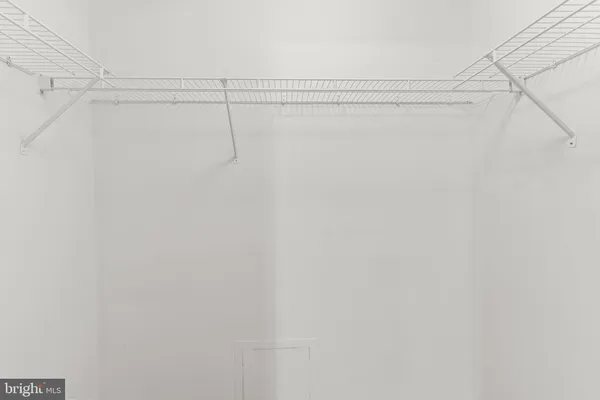 a view of a room with racks on the wall