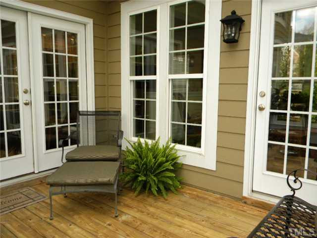 3704 Laurel Hills Road Raleigh, NC 27612 - Photo 20 of 25 Relax on this cozy deck overlooking the backyard which includes gas line for your grill. Patio/Deck