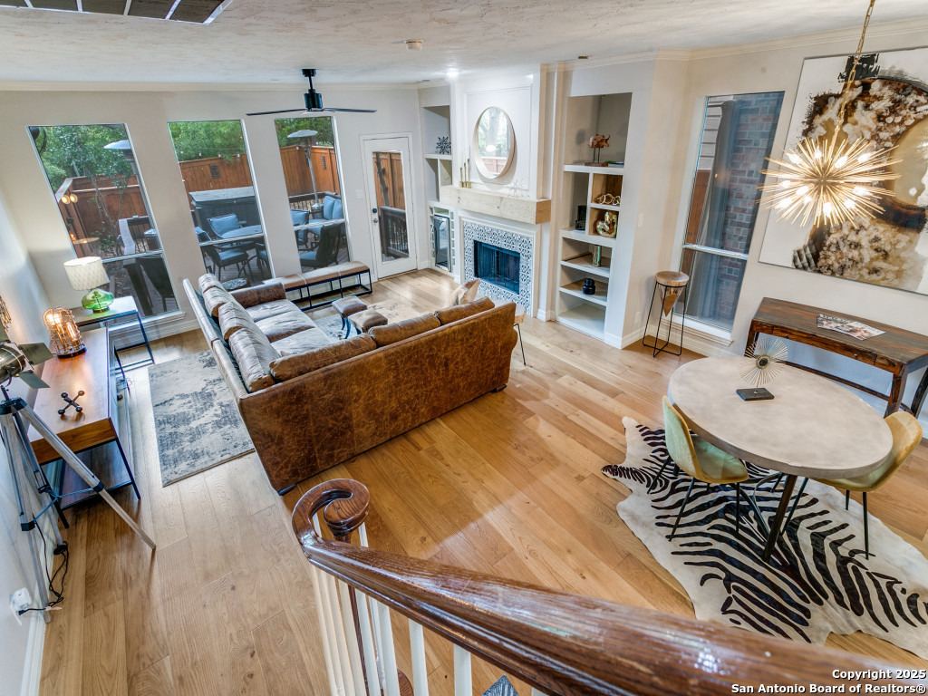 147 Elizabeth Road Alamo Heights, TX 78209 - Photo 12 of 25 a living room with furniture and a wooden floor