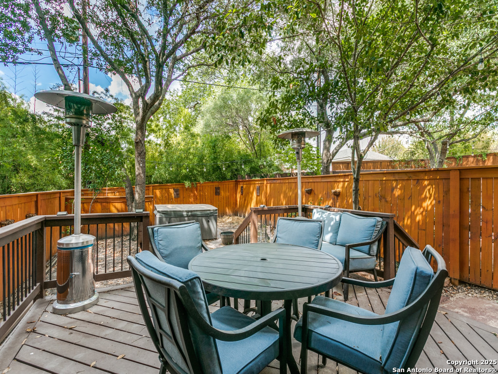 147 Elizabeth Road Alamo Heights, TX 78209 - Photo 22 of 25 a backyard of a house with outdoor seating