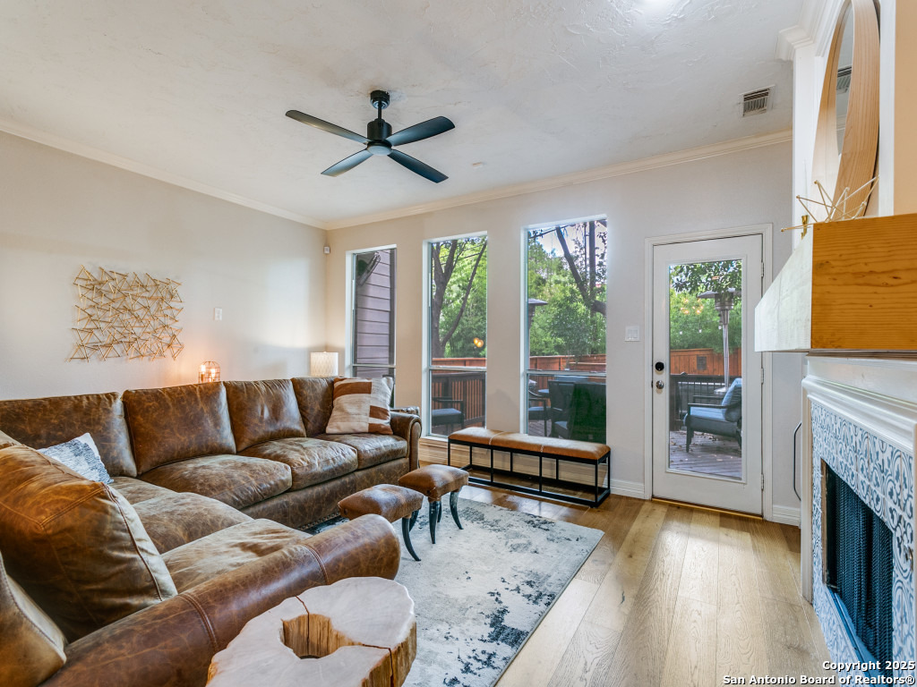 147 Elizabeth Road Alamo Heights, TX 78209 - Photo 6 of 25 a living room with furniture and a fireplace