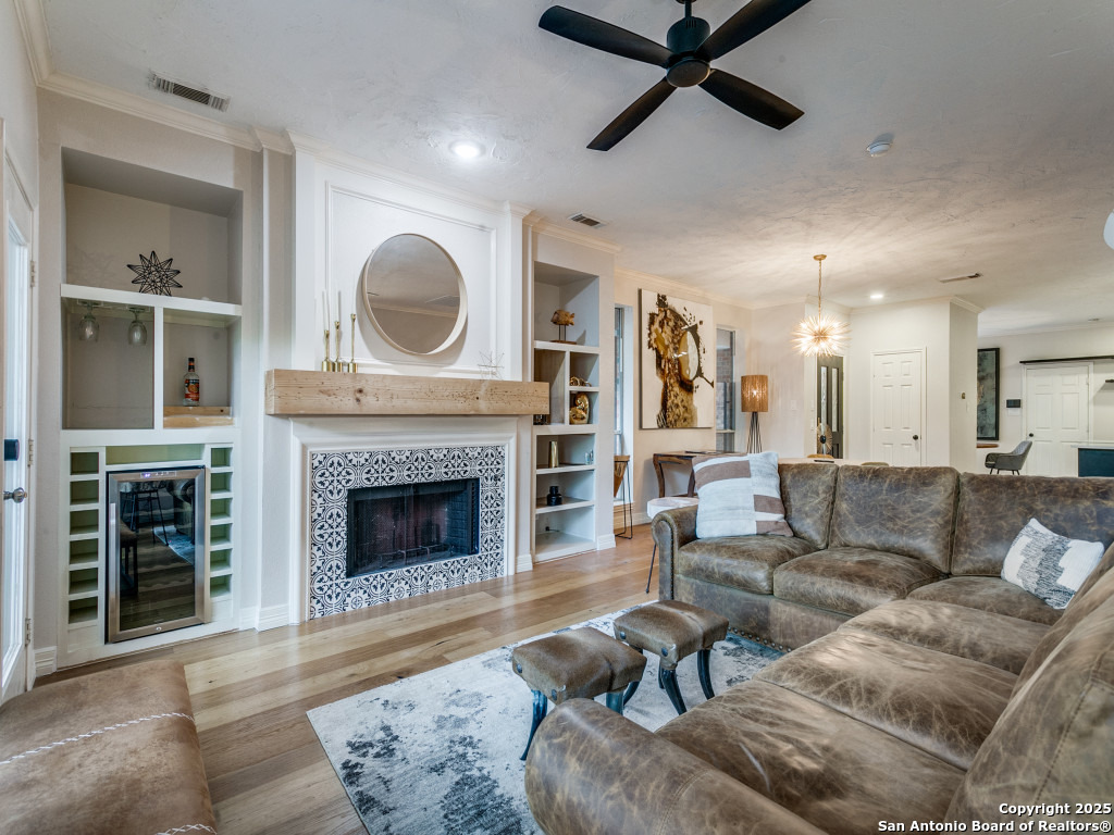 147 Elizabeth Road Alamo Heights, TX 78209 - Photo 7 of 25 a living room with furniture and a fireplace