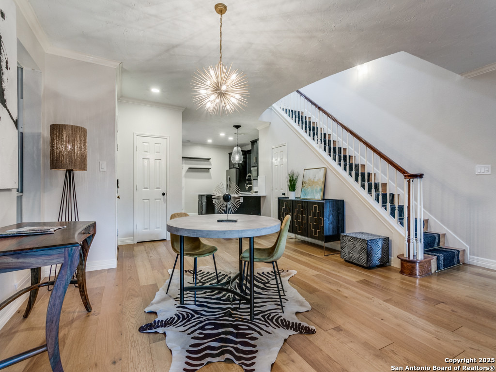 147 Elizabeth Road Alamo Heights, TX 78209 - Photo 9 of 25 a view of a livingroom with furniture stairs and a chandelier