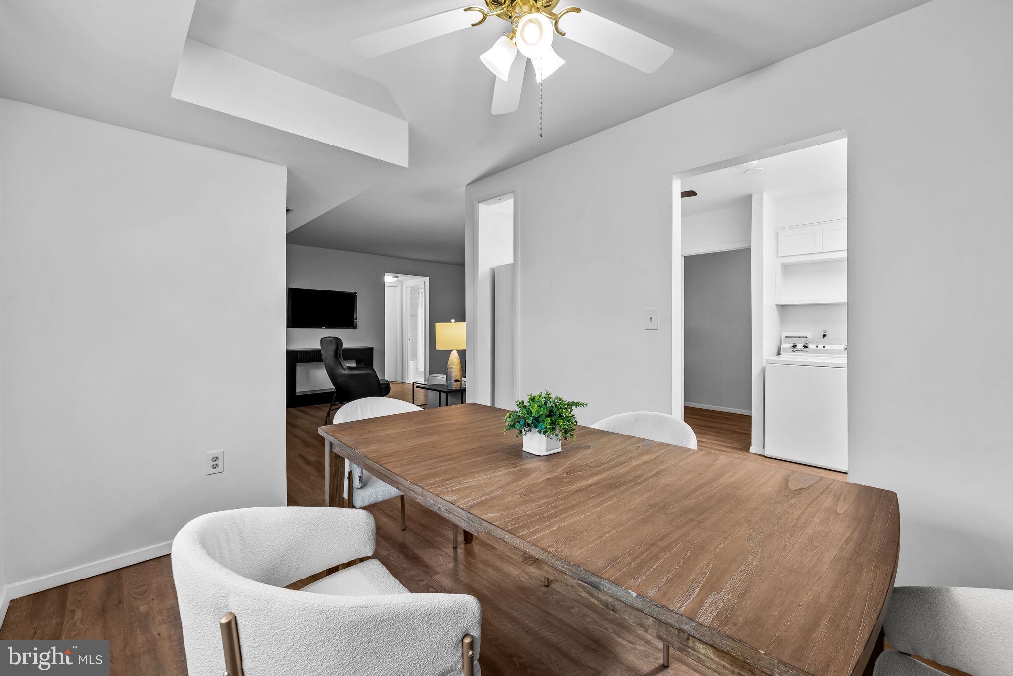 12 Cardor Court, Unit 100 Nottingham, MD 21236 - Photo 13 of 21 a room with furniture and wooden floor