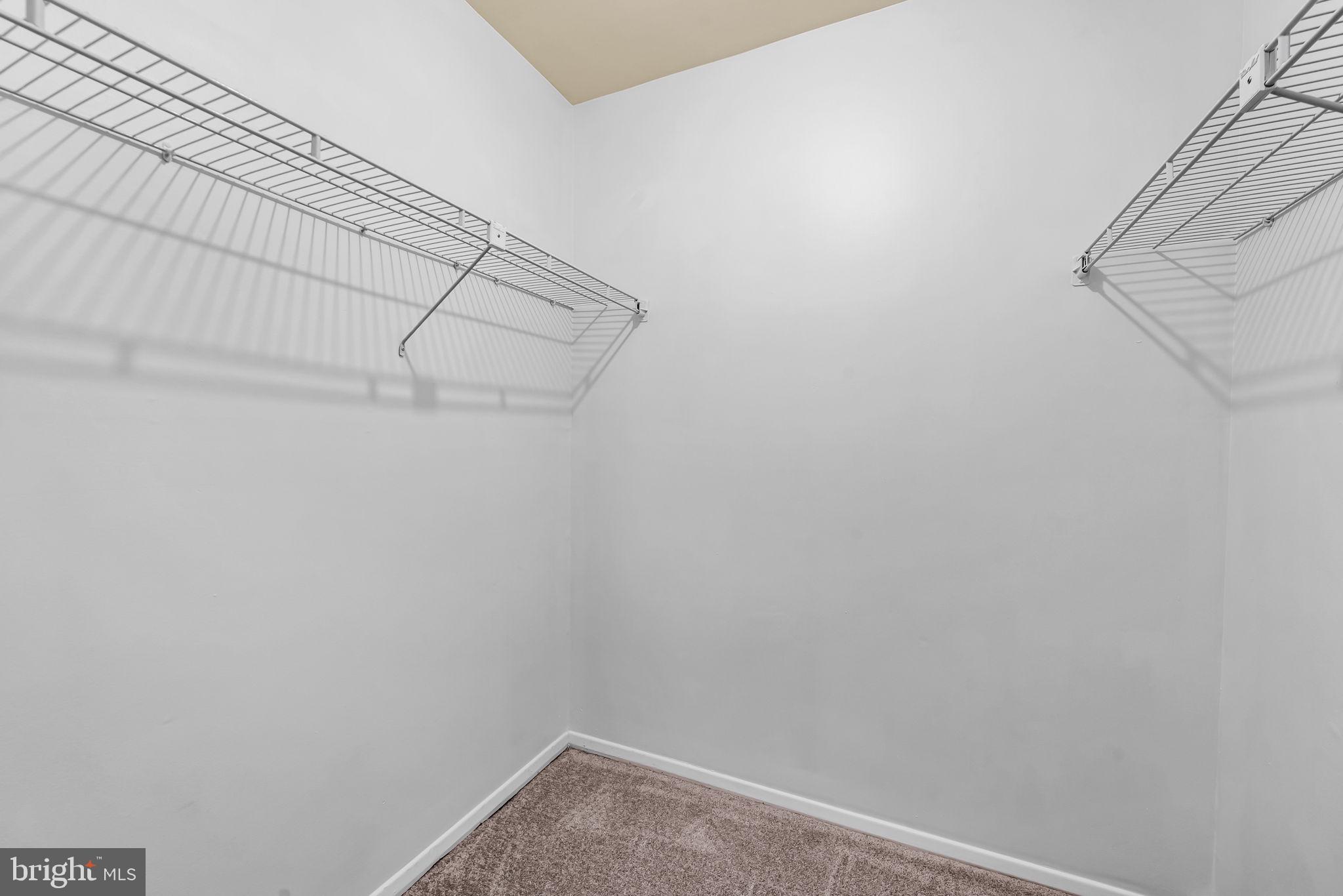 12 Cardor Court, Unit 100 Nottingham, MD 21236 - Photo 20 of 21 a view of a room with racks on the wall