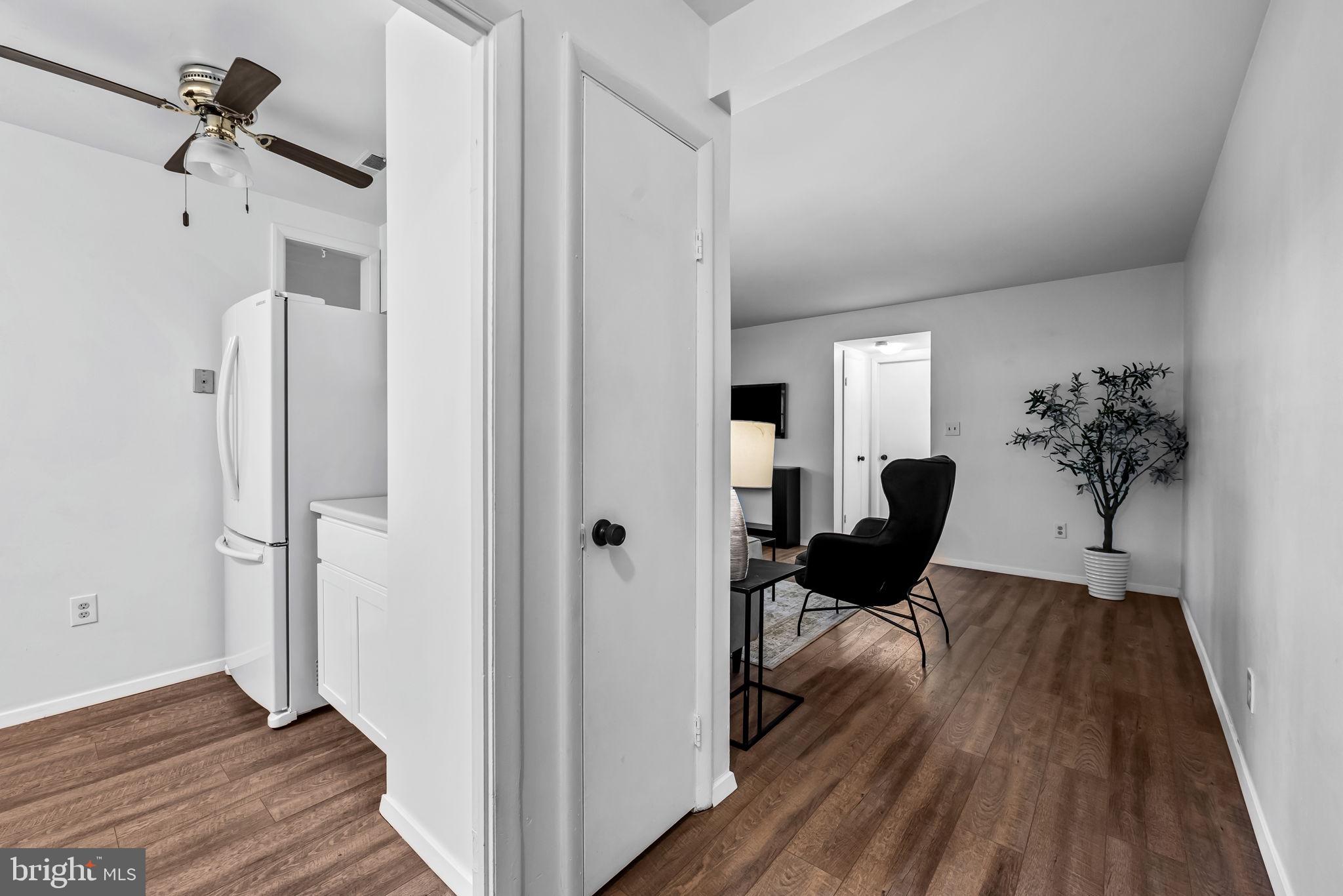 12 Cardor Court, Unit 100 Nottingham, MD 21236 - Photo 3 of 21 a view of a livingroom with furniture and hardwood floor