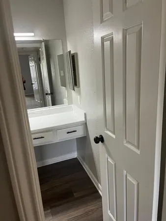 a bathroom with a sink and mirror