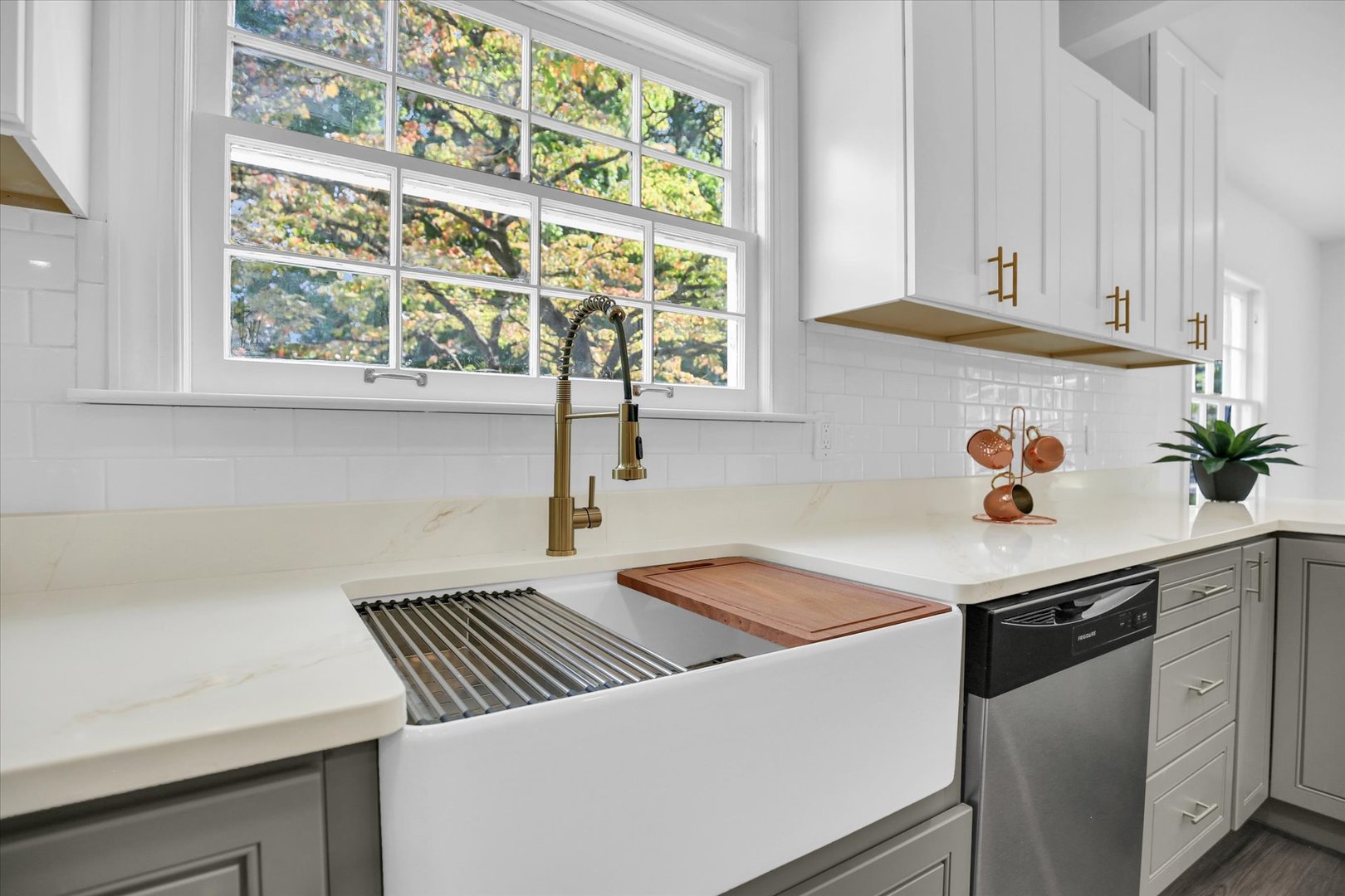 1212 West Healey Street Champaign, IL 61821 - Photo 21 of 63 a kitchen with a sink and a window
