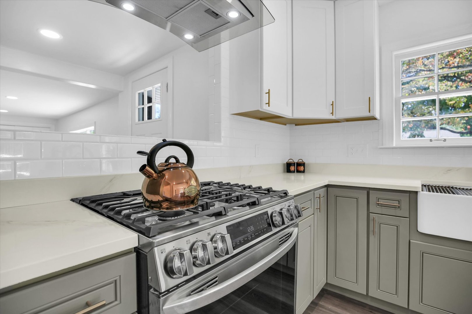 1212 West Healey Street Champaign, IL 61821 - Photo 22 of 63 a stove top oven sitting inside of a kitchen