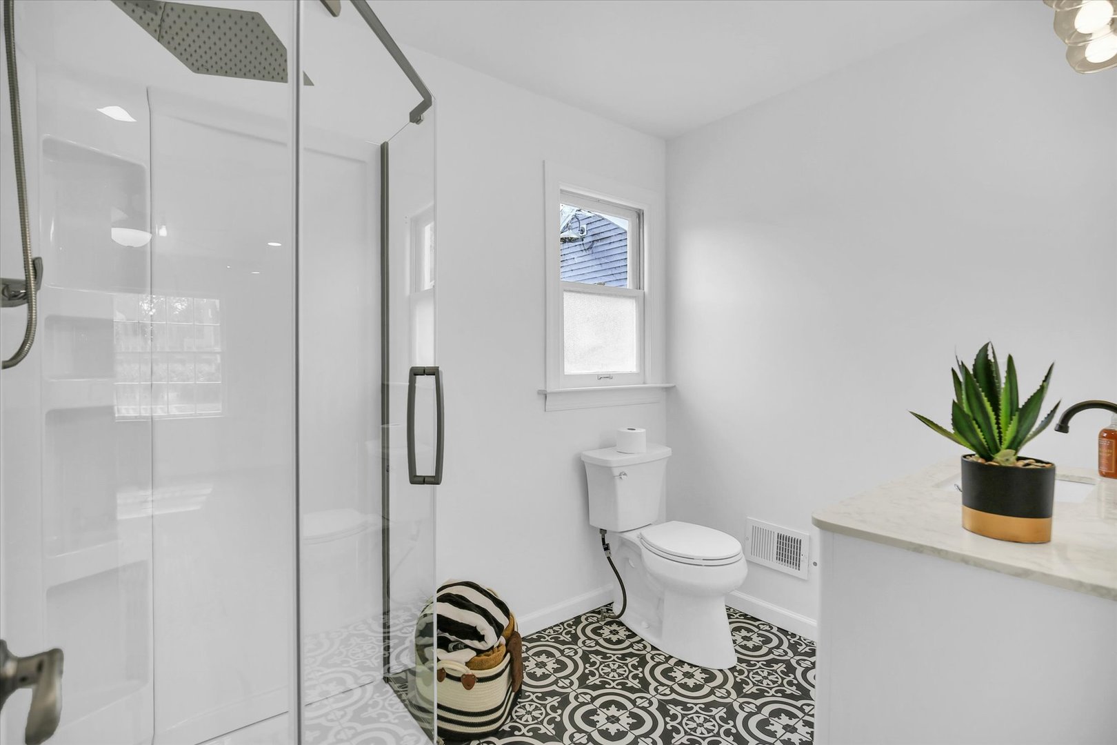 1212 West Healey Street Champaign, IL 61821 - Photo 27 of 63 a bathroom with a toilet a sink and shower