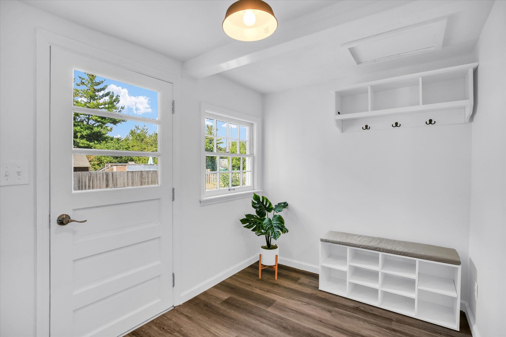 1212 West Healey Street Champaign, IL 61821 - Photo 30 of 63 a view of wooden floor and windows in a room