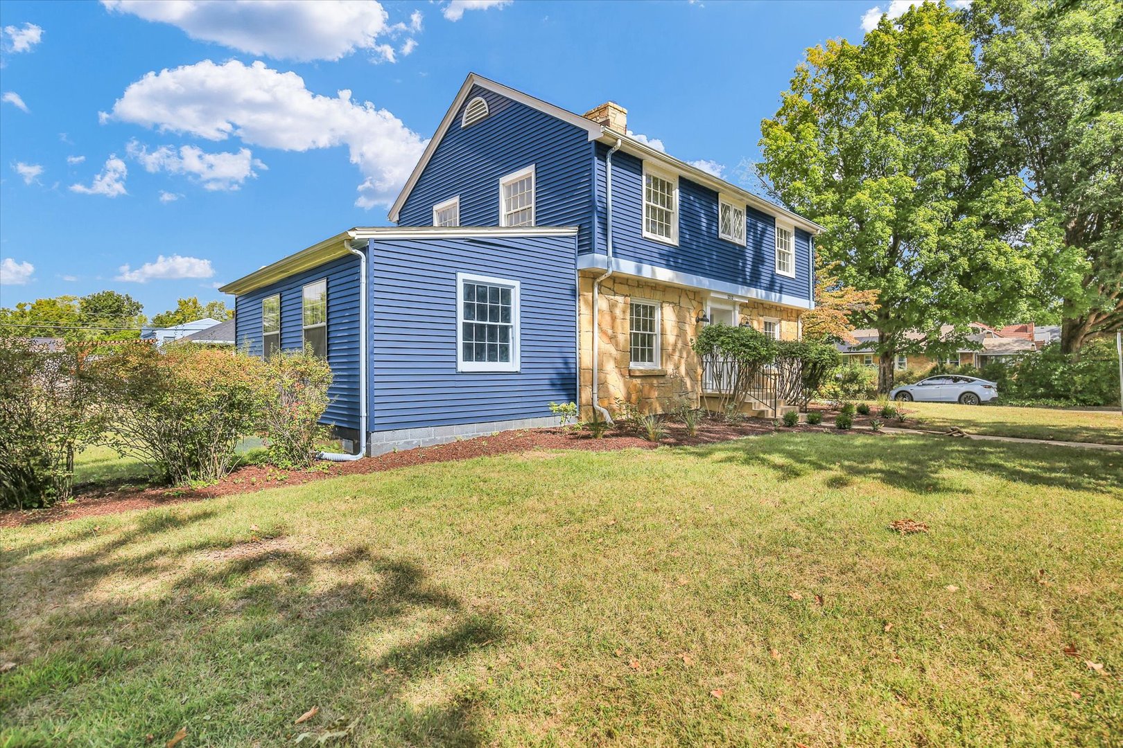 1212 West Healey Street Champaign, IL 61821 - Photo 3 of 63 a front view of a house with a yard