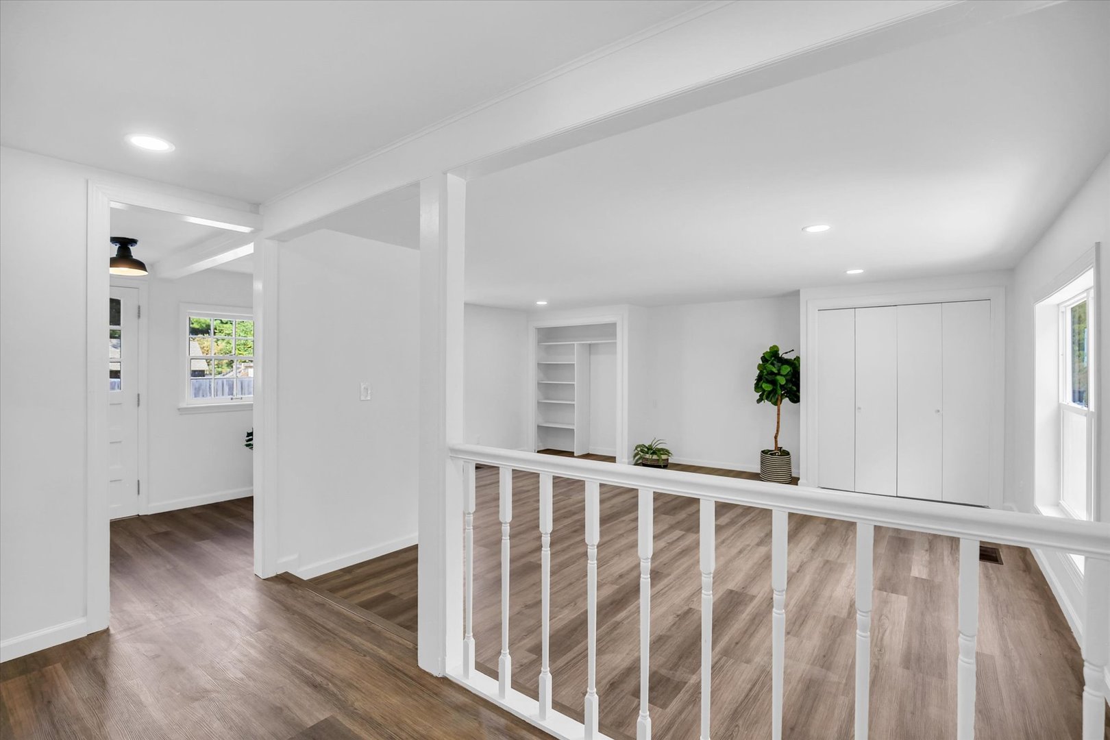 1212 West Healey Street Champaign, IL 61821 - Photo 36 of 63 a view of wooden floor and windows in a room