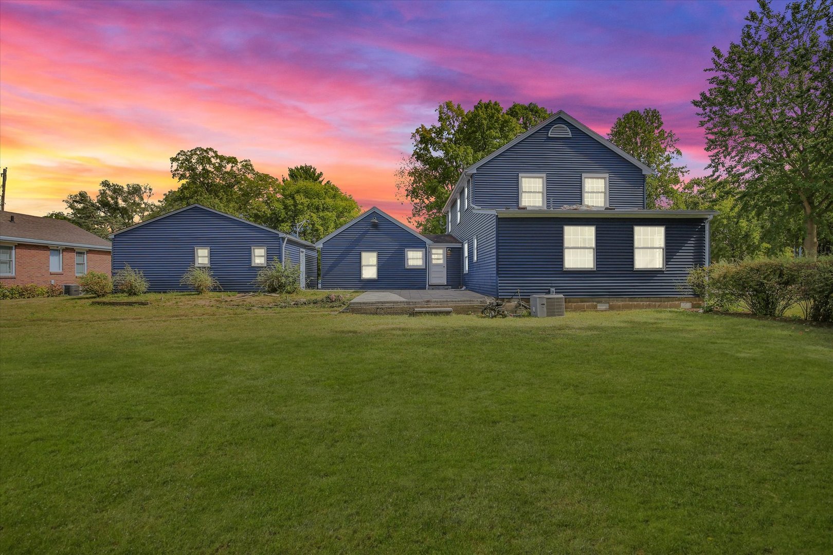 1212 West Healey Street Champaign, IL 61821 - Photo 62 of 63 a front view of a house with garden