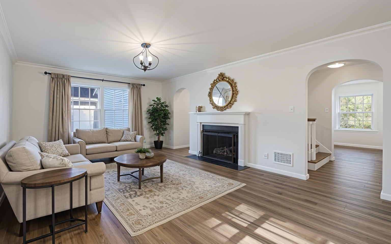 1212 West Healey Street Champaign, IL 61821 - Photo 9 of 63 a living room with furniture a fireplace and window