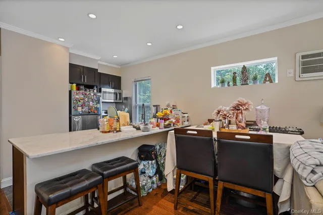 a bedroom with a bed and dresser