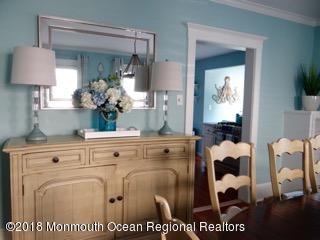 422 Worthington Avenue, Unit SUMMER 2026 Spring Lake, NJ 07762 - Photo 12 of 57 a view of living room with furniture and a lamp