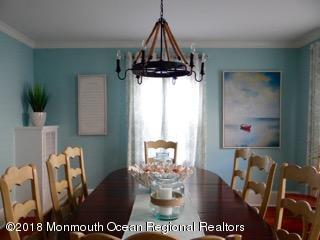 422 Worthington Avenue, Unit SUMMER 2026 Spring Lake, NJ 07762 - Photo 13 of 57 a view of a dining room with furniture