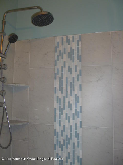 422 Worthington Avenue, Unit SUMMER 2026 Spring Lake, NJ 07762 - Photo 25 of 57 a bathroom with a shower