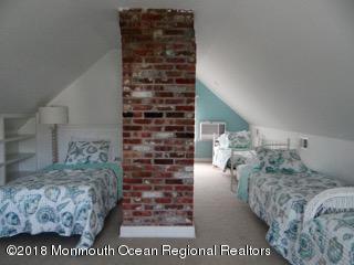 422 Worthington Avenue, Unit SUMMER 2026 Spring Lake, NJ 07762 - Photo 54 of 57 a living room with furniture