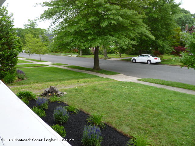 422 Worthington Avenue, Unit SUMMER 2026 Spring Lake, NJ 07762 - Photo 55 of 57 a car parked on the side of the road