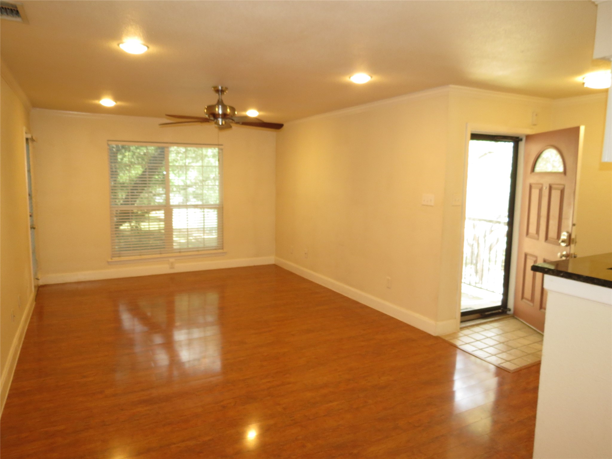 4159 Steck Avenue, Unit 269 Austin, TX 78759 - Photo 6 of 21 Natural light bathes this spacious room, featuring gleaming hardwood floors and convenient access to the entry.