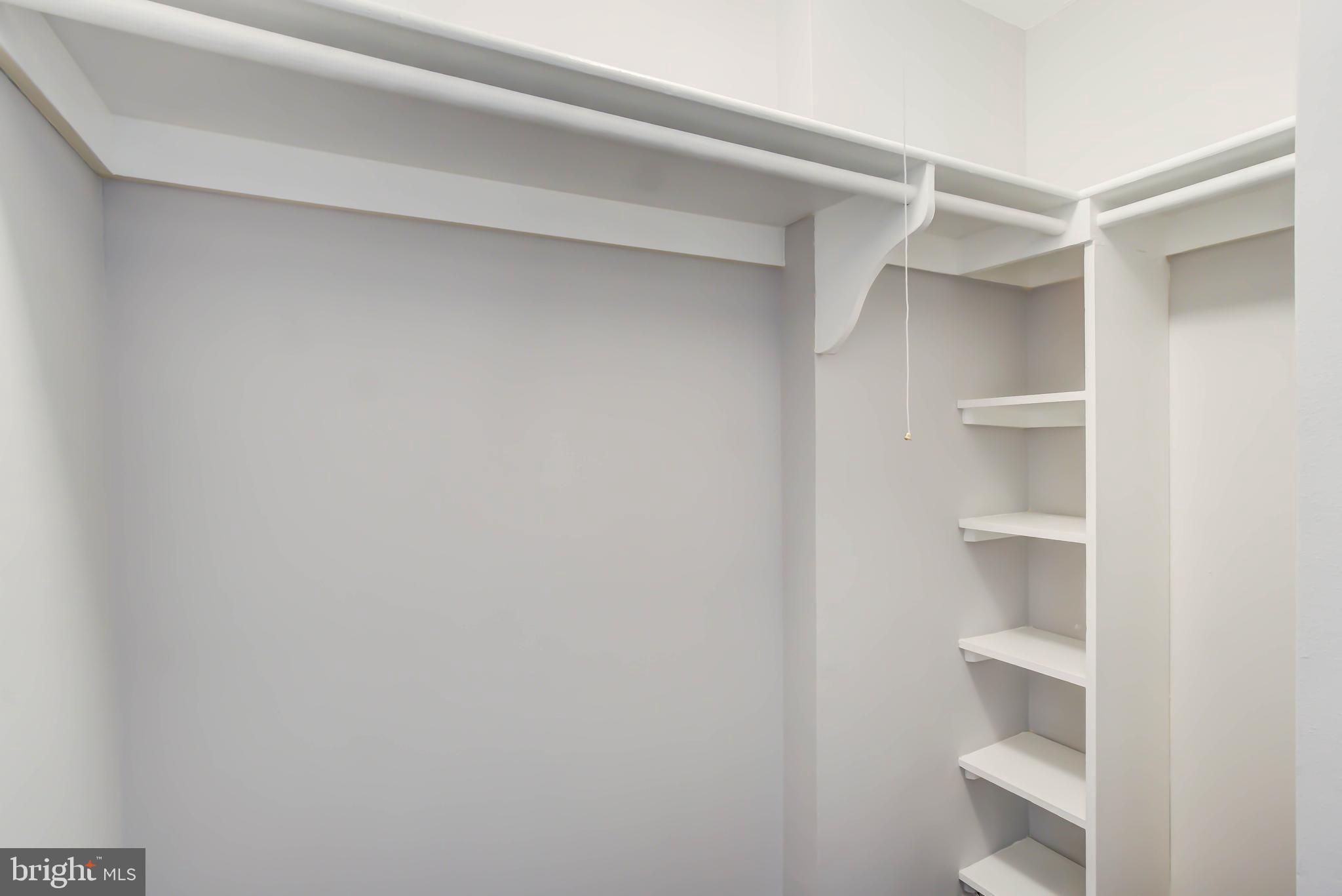 2111 Wisconsin Avenue Northwest, Unit 302 Washington, DC 20007 - Photo 16 of 23 a view of an empty walk in closet